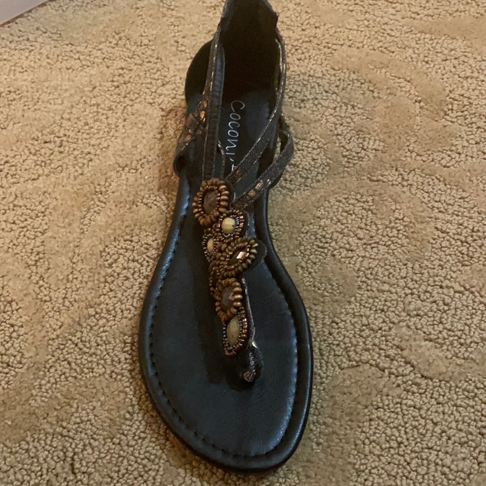 sandals in dark green canvas straps with flecks of gold  and beautiful stones.